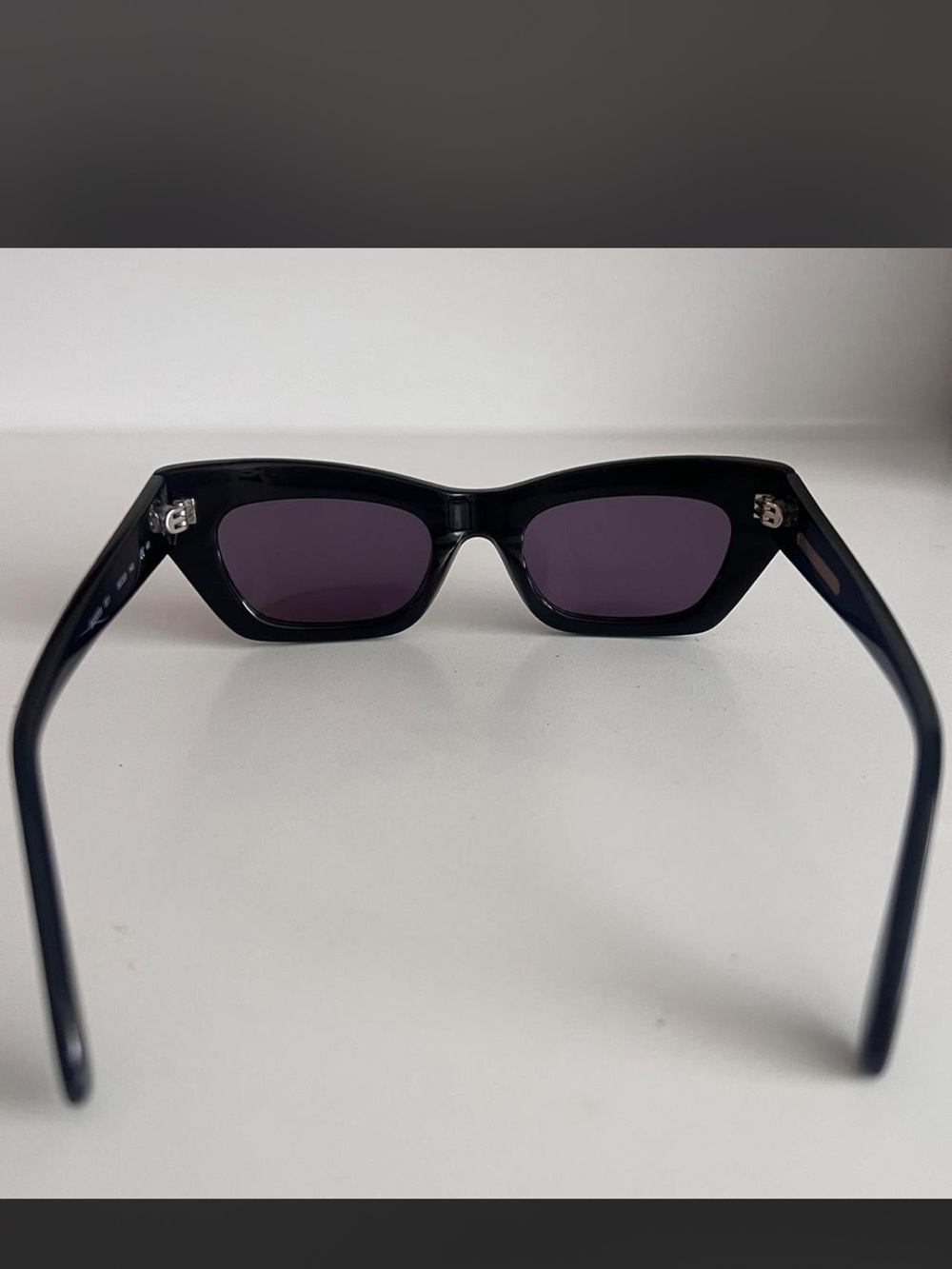 BCBGMaxAzria Black Frame Sunglasses with Dark Purple Lenses - Picture 3 of 7